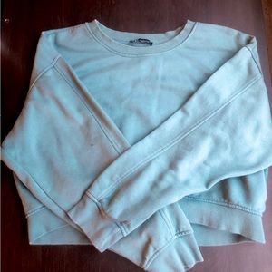 Cropped green sweater